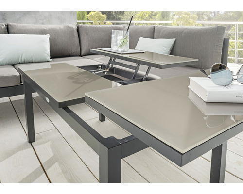 Table de jardin réglable en aluminium et verre sur une terrasse