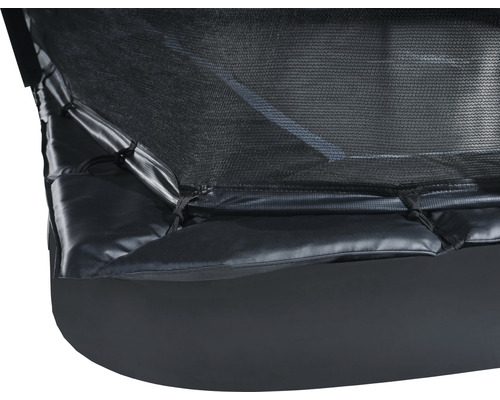 Detailaufnahme eines Trampolins mit Sicherheitsnetz und Randabdeckung.