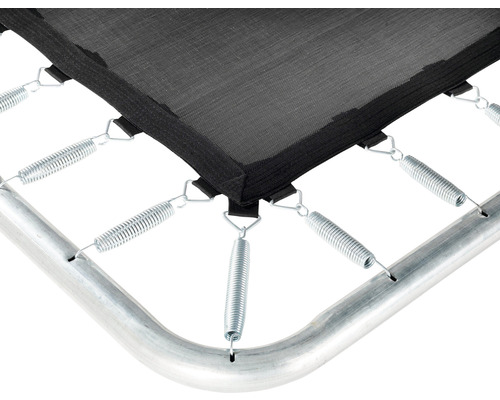 Gros plan d''un tapis de trampoline avec ressorts et cadre.