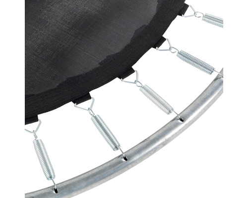 Gros plan d''un trampoline avec ressorts et cadre