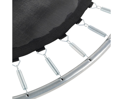 Vue détaillée d''un trampoline avec ressorts, toile de saut et cadre