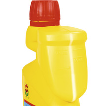 Vue détaillée d''une bouteille jaune avec chambre de dosage et bouchon rouge