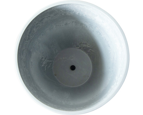 Vue intérieure d''un pot de fleurs rond avec trou de drainage