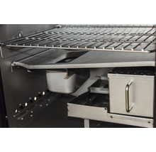 Vue intérieure d''un barbecue avec grille, bac de récupération des graisses et fumoir
