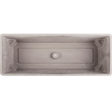 Vue intérieure d''un bac à fleurs rectangulaire avec trou de drainage