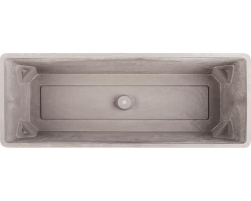 Vue intérieure d''un bac à fleurs rectangulaire avec trou de drainage