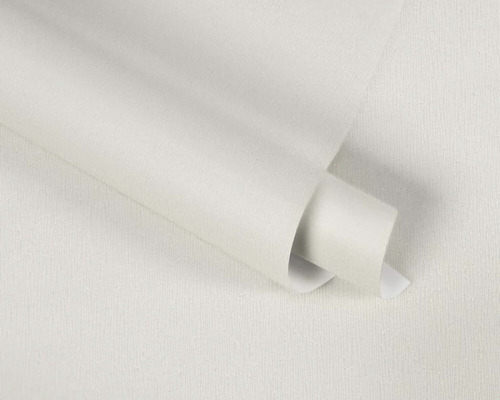 Weisse Vliestapete in aufgerollter Form