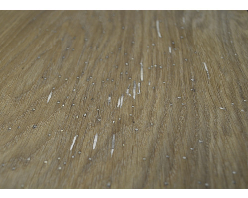 Gros plan d''une surface en bois avec des grains et de légers dommages.