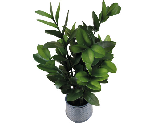 Künstliche Pflanze im Topf mit grünen Blättern.