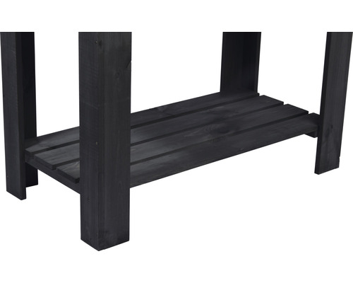 Vue détaillée d''une table de plantation en bois noire avec espace de rangement