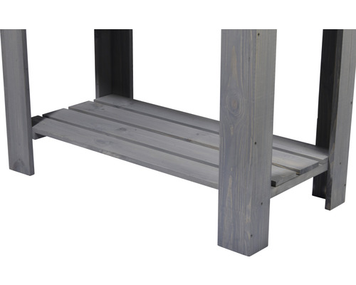 Gros plan d''une table en bois gris avec étagère