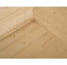 Vue intérieure d''une cabane de jardin avec murs et plancher en bois