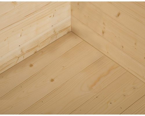 Vue intérieure d''une cabane de jardin avec murs et plancher en bois