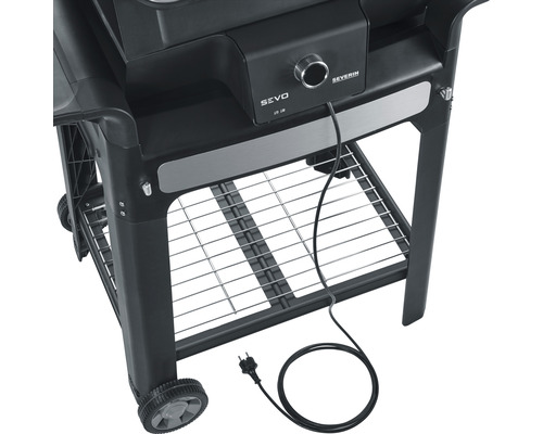 Vue détaillée d''un barbecue électrique avec grille de rangement et câble d''alimentation