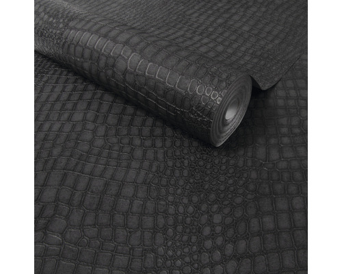 Eine Rolle Tapete mit Krokodilleder Muster.