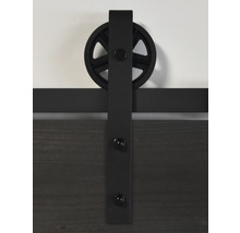 Vue détaillée d''une ferrure de porte coulissante avec suspension à roue