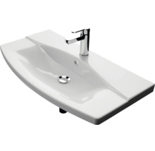 Waschbecken aus Keramik mit Armatur