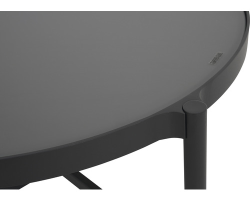 Vue détaillée d''une table de jardin ronde avec plateau en verre