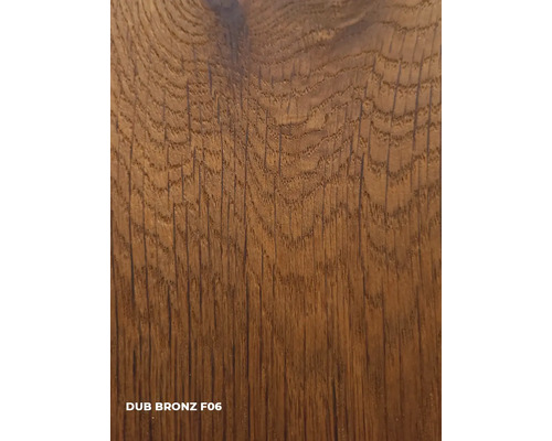 Gros plan d''une surface en bois avec le décor chêne bronze F06