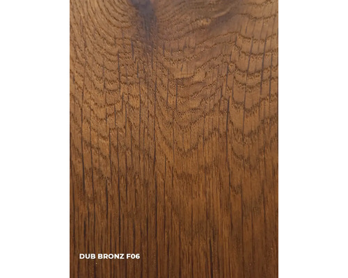 Gros plan d''une surface en bois bronze portant la mention Dub Bronz F06