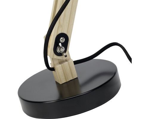 Vue détaillée d''une lampe de table avec structure en bois et pied noir