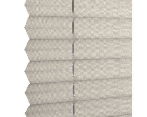 Gros plan d''un store plissé beige.