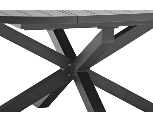 Vue détaillée d''une table de jardin avec un piètement en métal