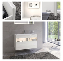 Modernes Badezimmer mit weißem Waschtischunterschrank, Steckdose mit USB Anschluss und Keuco Logo.
