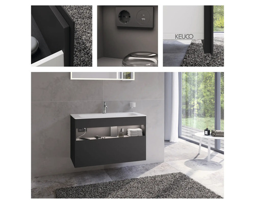 Badezimmer mit Waschbeckenunterschrank, Spiegel und Steckdose mit USB-Anschluss