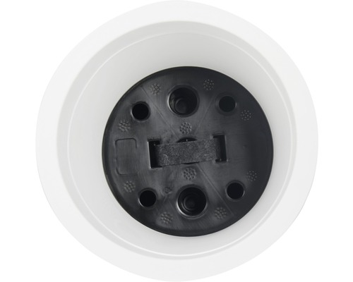 Vue sur la base noire d''une lampe LED dans un abat-jour blanc