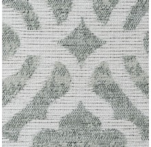 Gros plan d''un tapis avec un motif géométrique