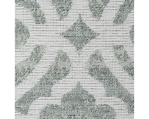 Gros plan d''un tapis avec un motif géométrique