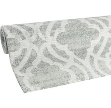Tapis roulé avec motif