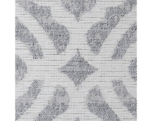 Gros plan d''un motif de tapis avec des formes géométriques