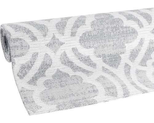 Tapis enroulé à motifs gris et blancs