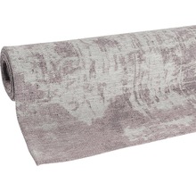 Tapis enroulé avec motif