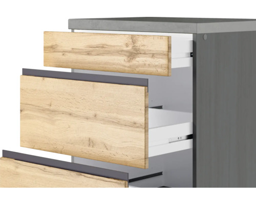 Meuble de salle de bains avec tiroirs ouverts en bois