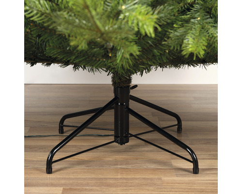 Gros plan du pied d'un arbre de Noël artificiel
