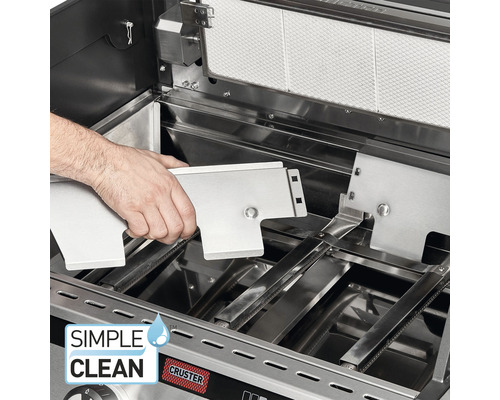 Innenansicht eines Gasgrills mit entnehmbaren Edelstahlteilen für eine einfache Reinigung.