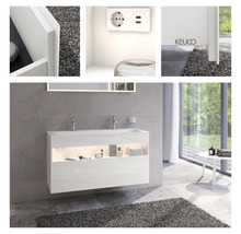 Salle de bains moderne avec meuble sous-vasque, miroir et éclairage