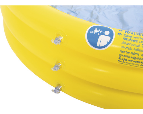 Detailansicht eines gelben Planschbeckens mit aufgedrucktem Warnhinweis und Ventilen