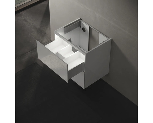 Meuble sous-lavabo avec tiroir ouvert pour rangement de salle de bain