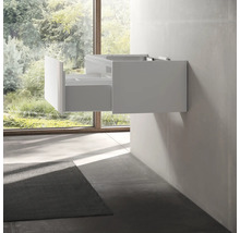 Meuble sous-lavabo avec tiroir dans une salle de bain.