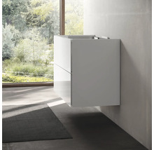 Meuble sous-lavabo suspendu avec deux tiroirs dans la salle de bain.