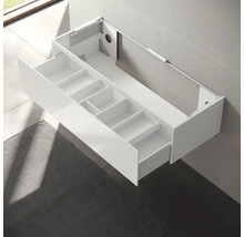 Meuble sous-lavabo blanc avec tiroirs pour rangement dans la salle de bain.