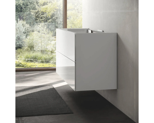 Meuble sous-lavabo suspendu dans une salle de bains avec deux tiroirs