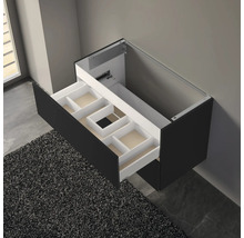 Meuble sous-lavabo avec tiroir coulissant et compartiments pour une salle de bain bien rangée