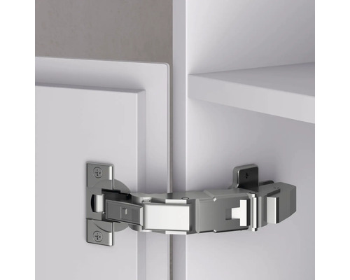 Scharnier an einer weißen Tür montiert