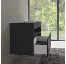 Meuble sous-vasque noir avec tiroir ouvert dans la salle de bain