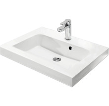 Waschbecken aus Keramik mit Armatur